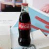 Pepsi Bottle A Coca Cola Glass