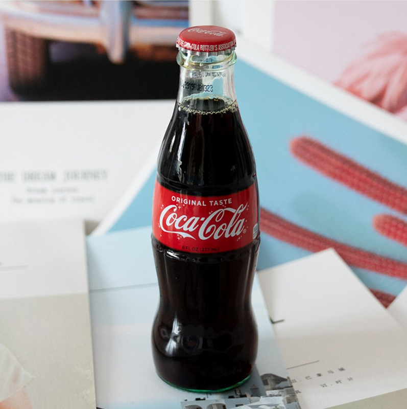 Pepsi Bottle A Coca Cola Glass