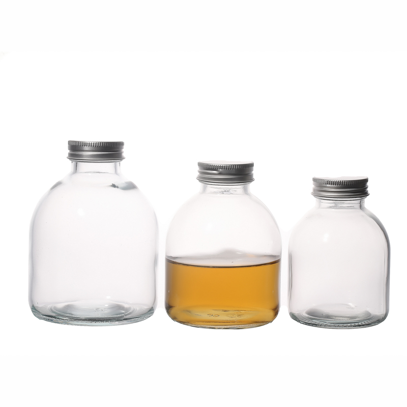 Glass Bottles in Round Shape with Screw Lids Hot Sale
